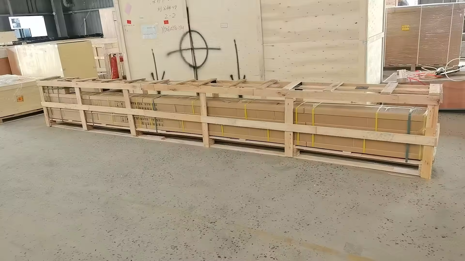Heavy-duty reinforced wooden crate packaging prepared for overseas shipment of custom motorized full cassette awning
