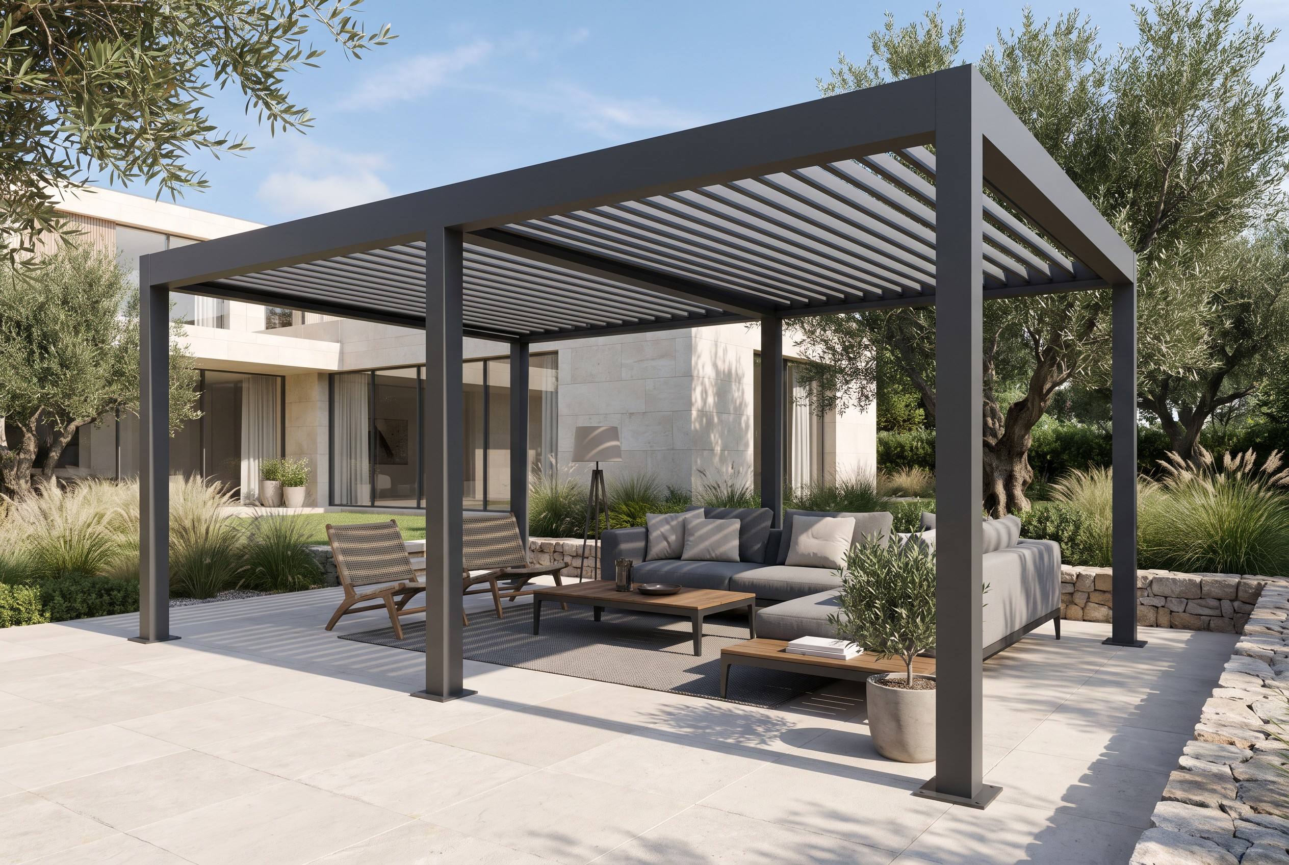 Modern freestanding dark gray aluminum louvered pergola with outdoor lounge furniture on a luxury villa garden patio