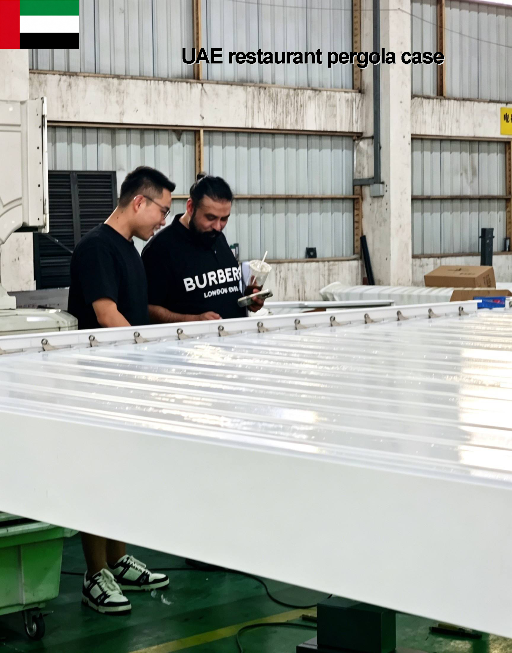 UAE restaurant commercial louvered pergola case study with client inspecting aluminum profiles during factory audit